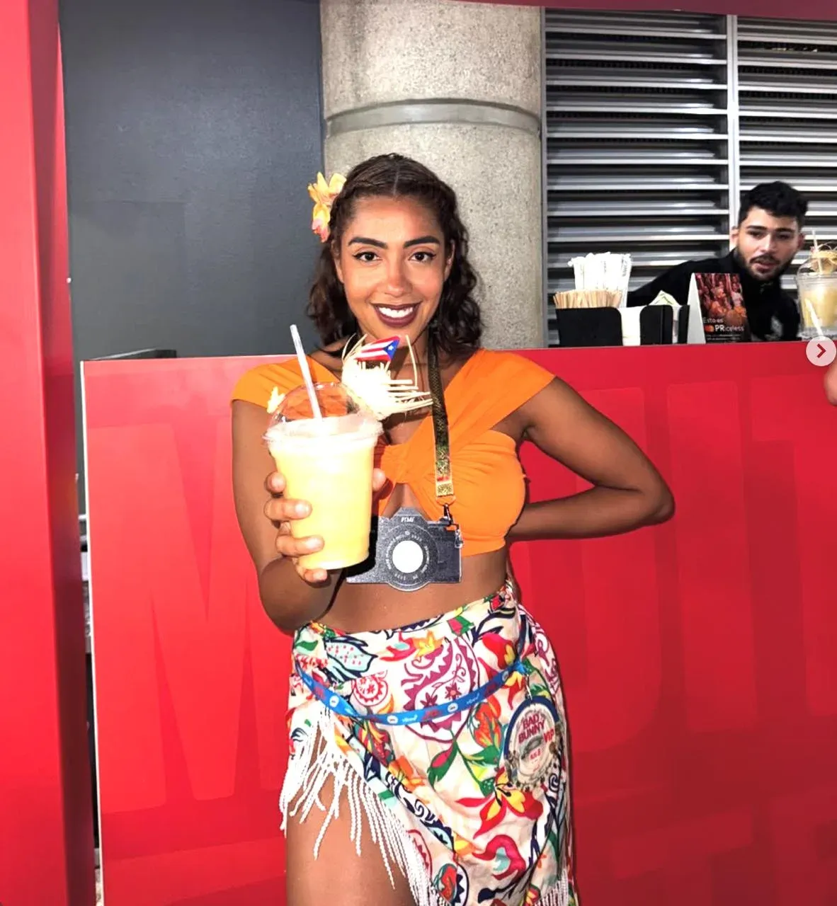 From Your Tampa Bestie: a woman holding a frozen drink at a Tampa restaurant